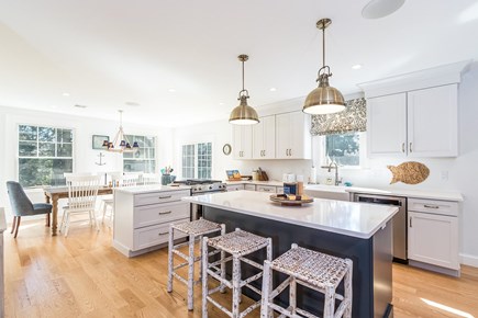 Osterville Cape Cod vacation rental - Kitchen with bar stools and dining area