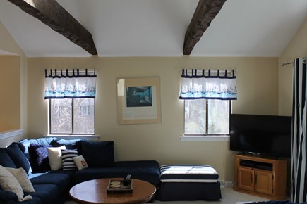 Falmouth, Waquoit Bay Cape Cod vacation rental - Living room - open floor with fireplace and access to deck