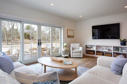 Barnstable Village Cape Cod vacation rental - Living room with access to exterior deck
