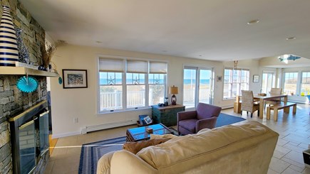 Eastham Cape Cod vacation rental - Sitting area with gas fireplace and amazing water views