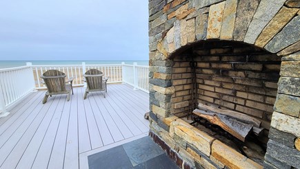 Eastham Cape Cod vacation rental - Roof deck with wood fireplace and Adirondack chairs