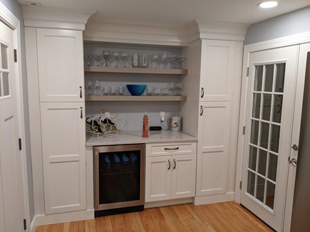 Falmouth Heights Cape Cod vacation rental - Side entryway/bar area (July 2023)