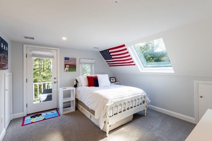 New Seabury Cape Cod vacation rental - Upstairs Bedroom with full bed, smart TV, and balcony