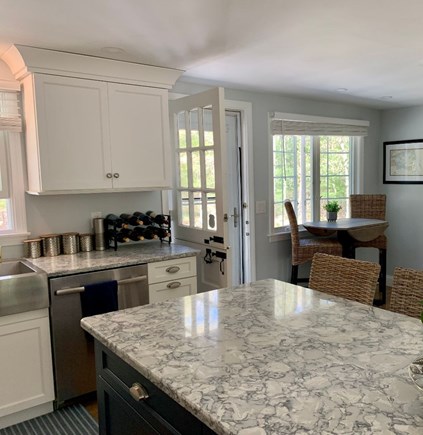 New Seabury Cape Cod vacation rental - Kitchen Pub-Table overlooking private gorgeous fenched in yard
