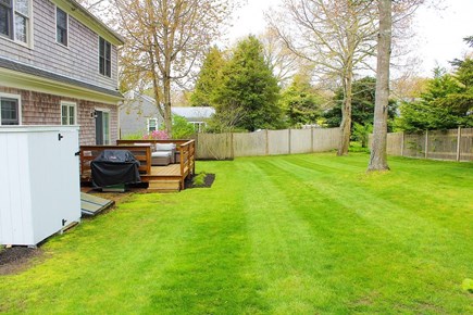 Yarmouth Port Cape Cod vacation rental - Large green backyard for outdoor games.