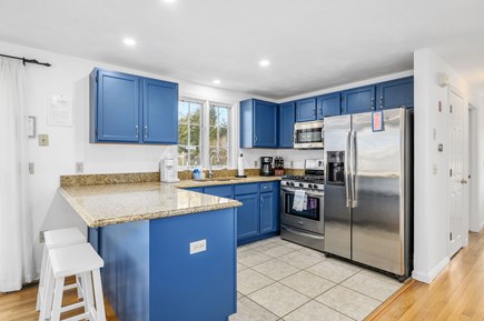 Yarmouth Port Cape Cod vacation rental - Fully equipped kitchen with breakfast bar and seating.