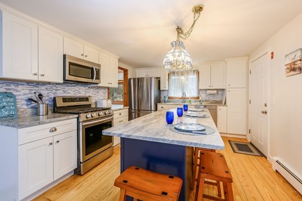 Harwich Cape Cod vacation rental - Large Kitchen with Island and seating.