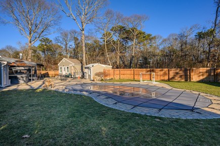 Hyannis Cape Cod vacation rental - Inground pool with large backyard.