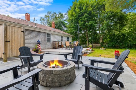 Yarmouth Cape Cod vacation rental - Wood burning fire pit with Adirondack chairs