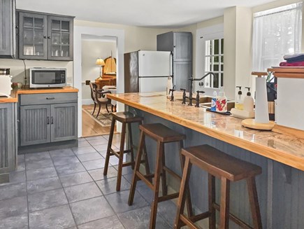 Orleans Cape Cod vacation rental - Modern kitchen that retains the Captain's house feel