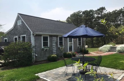 Chatham Cape Cod vacation rental - Front of the house with patio sitting area.
