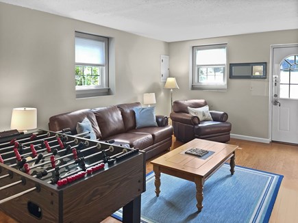 Harwich Cape Cod vacation rental - Lower level den with foosball.