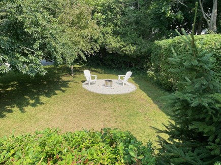 Harwich Cape Cod vacation rental - Backyard- firepit.