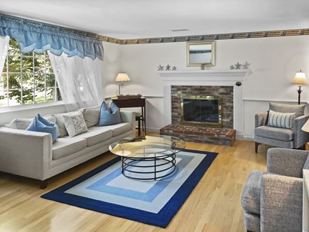 Harwich Cape Cod vacation rental - Living room with fireplace.