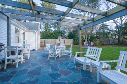 East Sandwich Cape Cod vacation rental - Outside patio area with plenty of seating and a grill.