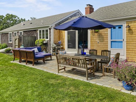 Chatham Cape Cod vacation rental - Outside patio with dining area and seating.