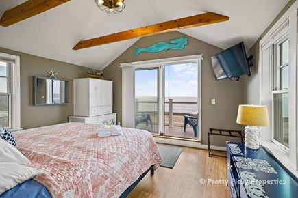 Wellfleet Cape Cod vacation rental - Upper level king master.  Deck has abreathtaking elevated view.
