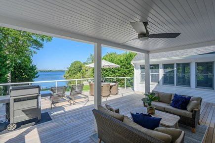 Centerville Cape Cod vacation rental - Bottom Deck- Seating, Grill, Water views.