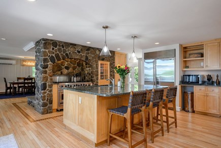 Centerville Cape Cod vacation rental - Kitchen with island and six-burner gas stove