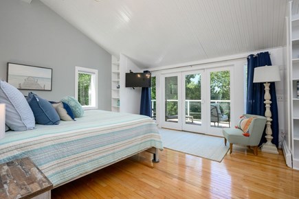 Centerville Cape Cod vacation rental - Bedroom #5- Primary with access to top deck overlooking water.