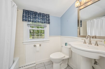 Harwich Port Cape Cod vacation rental - Bathroom # 2 full shower tub combo, pedestal sink and closet.