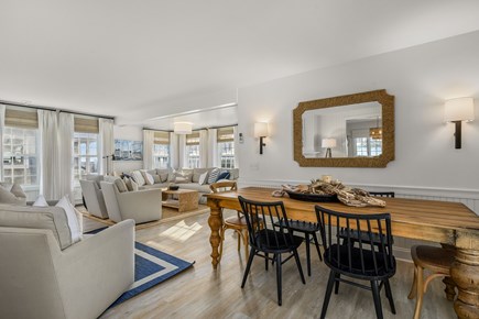 Harwich Port Cape Cod vacation rental - Dining area and living room - open concept.
