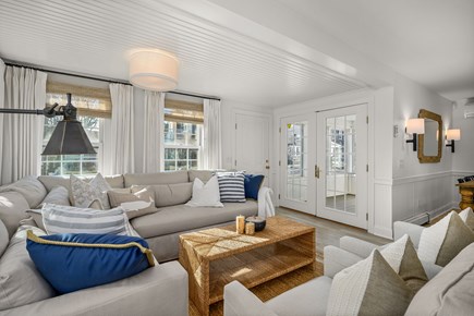 Harwich Port Cape Cod vacation rental - Living room with views of the porch.