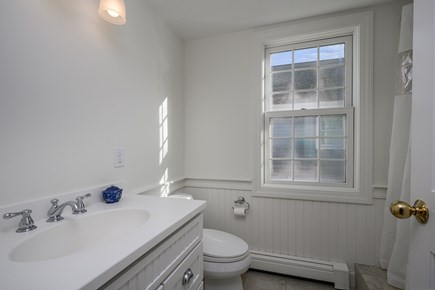 Harwich Port Cape Cod vacation rental - Full bathroom (new mirror being added). Primary's ensuite.