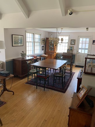 Yarmouth Port Cape Cod vacation rental - Sun-lit dining room with kitchen on right