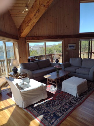 Wellfleet Cape Cod vacation rental - Living room open to Dining with deck and slendid water views