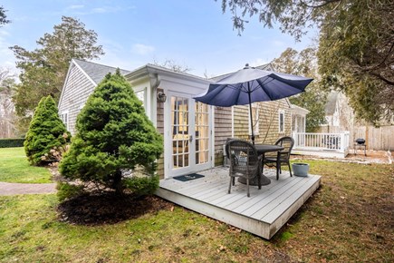Centerville Cape Cod vacation rental - Quiet patio w/ teak table with 4 chairs and an umbrella