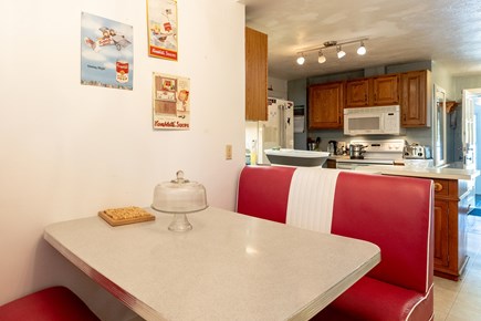 Brewster Cape Cod vacation rental - Throwback banquette for a quick meal.