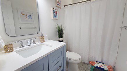 Truro Cape Cod vacation rental - Second floor bathroom with shower/tub