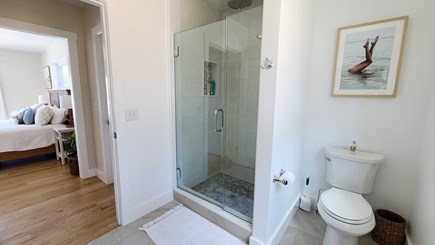 Truro Cape Cod vacation rental - Second floor primary bedroom en suite bathroom with shower