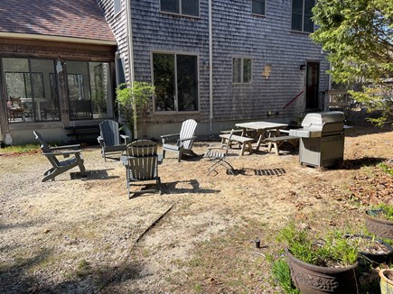 Wellfleet Cape Cod vacation rental - Backyard seating, picnic table and grill