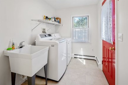 Wellfleet Cape Cod vacation rental - Washer and dryer with utility sink for those wet suits right insi