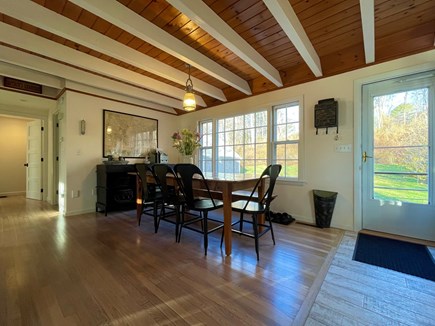 Sandwich, In Village across Shawme Pond Cape Cod vacation rental - Dining room and walk out to back deck and yard.