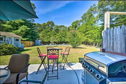 Falmouth Cape Cod vacation rental - Spacious backyard and patio with grill and firepit