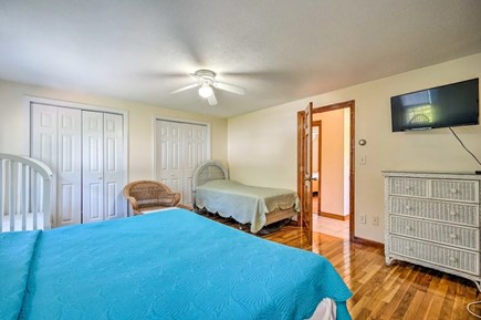 Falmouth Cape Cod vacation rental - King-size bed with crib and twin bed.
