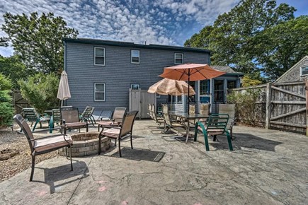 Falmouth Cape Cod vacation rental - Large patio with fire pit and grill.