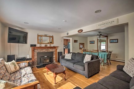 Falmouth Cape Cod vacation rental - Cozy living room with futon and fireplace