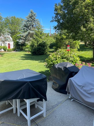 Brewster Cape Cod vacation rental - Patio with seating, grill and yard space includes stocked shed