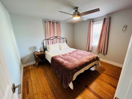 Dennis Port Cape Cod vacation rental - Queen bed with closet, dresser and smart tv