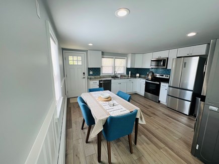 Dennis Port Cape Cod vacation rental - Spacious eat in kitchen w/ appliances including a washer/dryer