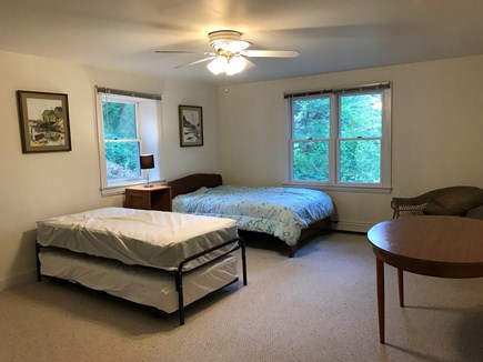 Chatham, Stillwater Pond Retreat Cape Cod vacation rental - 2nd Lower level bedroom with queen bed and two twin beds