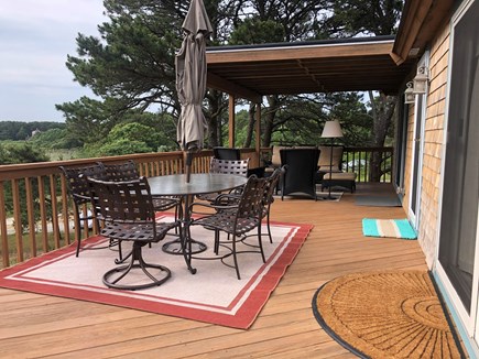 North Eastham Cape Cod vacation rental - Spacious Dining and Sitting Areas on partially covered deck