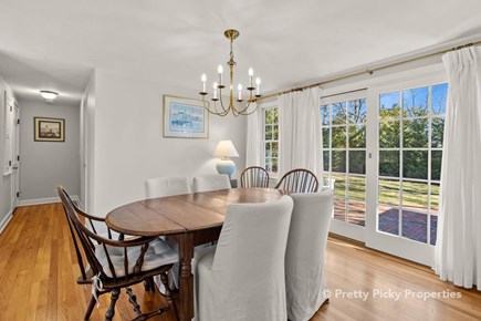 Orleans Cape Cod vacation rental - Elegant dining area with patio and yard view