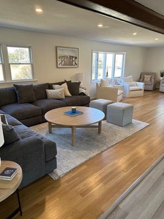 Pocasset Cape Cod vacation rental - Living room with multiple spaces to relax.