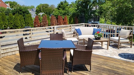 Chatham Cape Cod vacation rental - Back Deck set up with dining table and comfy sofa...gas grill