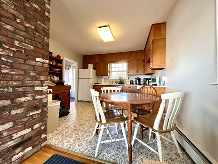 Falmouth Heights Cape Cod vacation rental - Kitchen with gas stove and open eating area